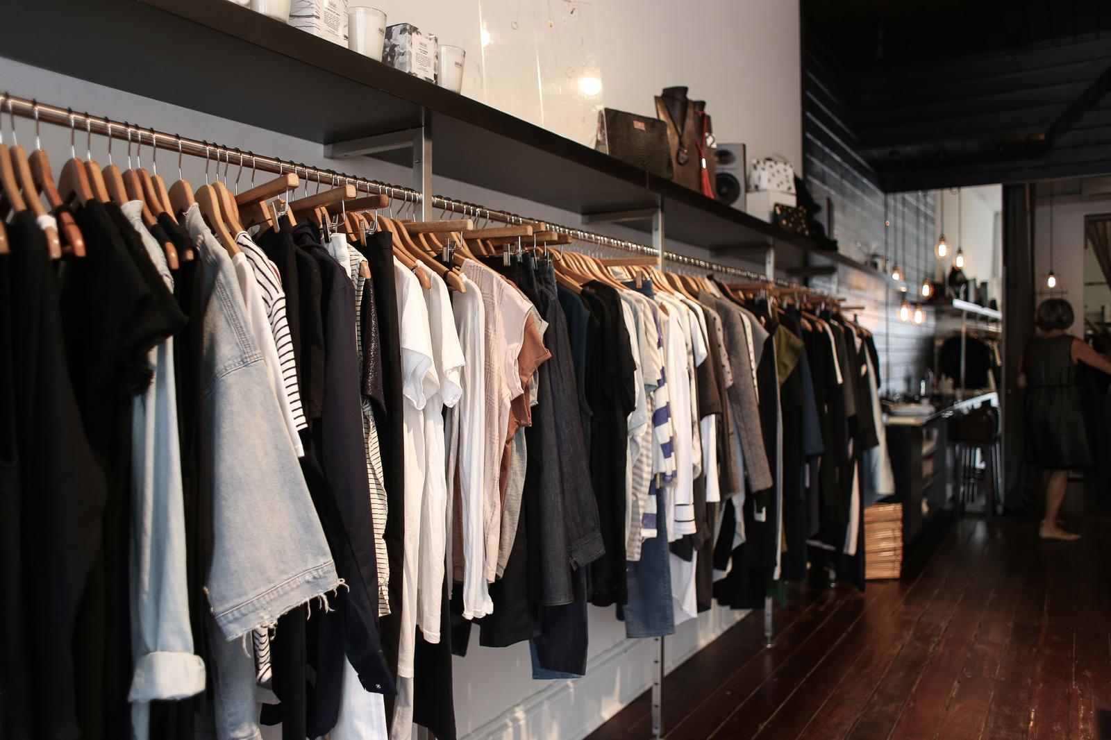 Racks of clothing running the length of a boutique floor — the rack-rental model Prototype is bringing to 320C Heretaunga Street West